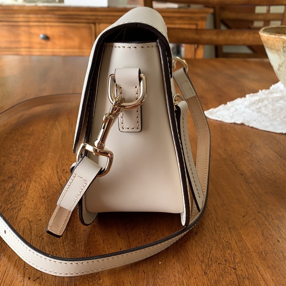 EUC Dooney and Bourke cream Leather Crossbody fold over satchel. Zip on back. - Picture 4 of 8